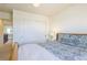 Bright bedroom with a comfortable bed, closet, and cozy decor, creating a relaxing retreat at 3754 Broadview Pl, Castle Rock, CO 80109