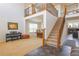 A two-story foyer shows high ceilings, a stairway and entry into dining room and living room at 3754 Broadview Pl, Castle Rock, CO 80109