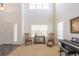 Bright living area with large window views and space for entertaining or relaxing at 3754 Broadview Pl, Castle Rock, CO 80109