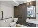 Stylish bathroom featuring modern fixtures, unique tile design, and a contemporary vanity at 485 E Arizona Ave, Denver, CO 80210