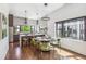 Open kitchen and dining area featuring stainless steel appliances and plenty of natural light at 485 E Arizona Ave, Denver, CO 80210