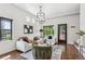 Bright and stylish living room with hardwood floors, featuring contemporary decor and natural light at 485 E Arizona Ave, Denver, CO 80210