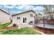 Spacious backyard with a trampoline and a patio, perfect for outdoor activities at 464 Chiswick Cir, Highlands Ranch, CO 80126