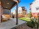 Inviting backyard with patio, seating, grill, and low-maintenance turf at 4125 Coriander St, Castle Rock, CO 80109