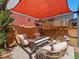Cozy backyard with patio seating, fire pit, and shaded pergola at 4125 Coriander St, Castle Rock, CO 80109