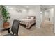 Bright bedroom with neutral walls, plush carpet, ample light and stylish decor at 4125 Coriander St, Castle Rock, CO 80109
