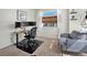 Home office with dual monitors, comfortable chair, and natural light at 4125 Coriander St, Castle Rock, CO 80109