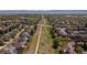 Aerial shot of neighborhood featuring community green space with walking paths and scenic views at 9719 Burberry Way, Highlands Ranch, CO 80129
