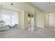 Finished basement features a window seat, tile floors, and an adjacent access to the backyard at 9719 Burberry Way, Highlands Ranch, CO 80129