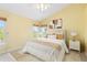 Comfortable bedroom with natural light, neutral colors, and a cozy bed at 9719 Burberry Way, Highlands Ranch, CO 80129