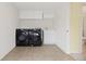 Convenient laundry room with modern washer and dryer, sink and overhead cabinets for storage at 9719 Burberry Way, Highlands Ranch, CO 80129