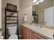 Powder room features a toilet, sink and decor at 1251 Double Eagle Ct, Castle Rock, CO 80104