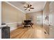 Bedroom featuring hardwood floors, a ceiling fan, and a window at 1251 Double Eagle Ct, Castle Rock, CO 80104