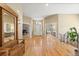 Open foyer with hardwood floors and views into multiple rooms of the home at 1251 Double Eagle Ct, Castle Rock, CO 80104