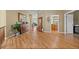 Spacious hallway with hardwood floors, decorative accents, and an open layout connecting various living spaces at 1251 Double Eagle Ct, Castle Rock, CO 80104