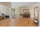 Spacious living area boasts hardwood floors and neutral paint, filled with natural light at 1251 Double Eagle Ct, Castle Rock, CO 80104
