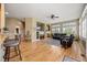 Spacious living room boasts hardwood floors, fireplace, and natural light at 1251 Double Eagle Ct, Castle Rock, CO 80104