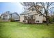 Well-maintained backyard with a wooden deck and lush lawn at 329 Lodgewood Ln, Lafayette, CO 80026