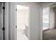 En-suite bathroom with tub and separate tiled shower, showcasing contemporary design at 329 Lodgewood Ln, Lafayette, CO 80026