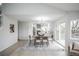 Open-concept dining area connected to the kitchen and living room at 329 Lodgewood Ln, Lafayette, CO 80026