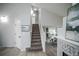 Inviting entryway with staircase leading to the upper level at 329 Lodgewood Ln, Lafayette, CO 80026