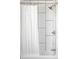 Bathroom with a modern white shower featuring black-trimmed subway tile and chrome shower head at 12680 W 38Th Dr, Wheat Ridge, CO 80033