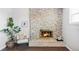 Living room fireplace featuring tile accents and a cozy seating area at 12680 W 38Th Dr, Wheat Ridge, CO 80033