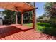 An expansive backyard patio with a ceiling fan offers a tranquil outdoor space with a view of the fenced yard at 4032 Lipan St, Denver, CO 80211
