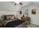 Bedroom with a comfortable bed, a dresser, and a ceiling fan at 4032 Lipan St, Denver, CO 80211