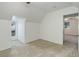 A neutral carpeted bedroom featuring two windows and white walls at 4032 Lipan St, Denver, CO 80211