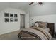 Cozy bedroom featuring a comfortable bed, neutral decor, and a ceiling fan at 4032 Lipan St, Denver, CO 80211