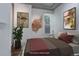 Cozy bedroom boasts decorative artwork and ample natural light at 4032 Lipan St, Denver, CO 80211