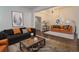 Cozy living room with designer furnishings and an open layout at 4032 Lipan St, Denver, CO 80211
