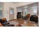 Stylishly staged living room showcasing hardwood floors and an open layout at 4032 Lipan St, Denver, CO 80211