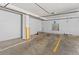 Interior view of parking garage with painted parking lines and accessible space at 3299 Lowell Blvd # 102, Denver, CO 80211