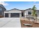 Charming single-Gathering home boasting a three-car garage, stylish accents, and well-maintained landscaping at 3443 N Gold Bug Ct, Aurora, CO 80019