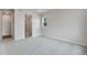 Spacious main bedroom featuring carpet, large windows, and an ensuite bathroom with a glass shower at 3443 N Gold Bug Ct, Aurora, CO 80019