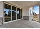 Covered patio with concrete flooring and views of backyard and neighborhood homes at 3443 N Gold Bug Ct, Aurora, CO 80019