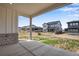 Covered patio with concrete flooring and views of the neighborhood homes at 3443 N Gold Bug Ct, Aurora, CO 80019