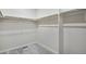Spacious walk-in closet with ample shelving provides plenty of storage space at 3443 N Gold Bug Ct, Aurora, CO 80019