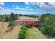Aerial view featuring the home's backyard and mature landscaping at 10325 Cherrywood Dr, Parker, CO 80138