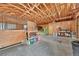 Interior barn space with wooden stalls, providing a functional and organized area at 10325 Cherrywood Dr, Parker, CO 80138