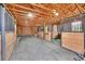 Inside a well-maintained barn with wooden stalls, offering ample space for animals at 10325 Cherrywood Dr, Parker, CO 80138