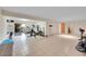 Spacious basement area offering flexible use for a home gym, with door to the exterior at 10325 Cherrywood Dr, Parker, CO 80138