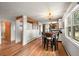 Open kitchen features stainless appliances, a kitchen island, and a sunny breakfast nook at 10325 Cherrywood Dr, Parker, CO 80138