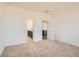Bedroom with ensuite bathroom and an open door leading to another room at 13826 Honey Hush Trl, Parker, CO 80134