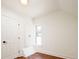 This bedroom features light walls, hardwood floors, closet, and natural light from the window at 3519 Newton St, Denver, CO 80211