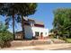Charming home with landscaped front yard and unique architectural details at 3519 Newton St, Denver, CO 80211