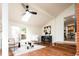 Cozy living room with skylight, comfortable seating, hardwood floors, and stylish accents at 3519 Newton St, Denver, CO 80211