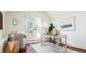 Bright home office with desk, comfortable chair, wood floor, and access to a balcony at 3519 Newton St, Denver, CO 80211